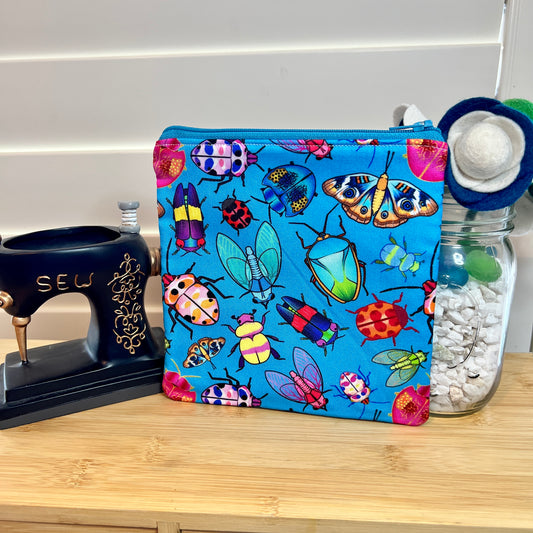 Bugs on Blue Square Zip/Makeup Bag